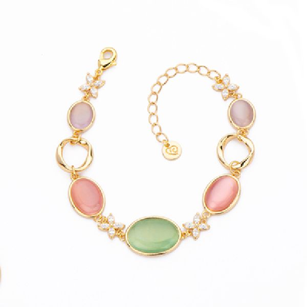 Bracciale elementi torchon in brass dorato intervallati da fiori in zirconi navette clear e cat eye tanzanite, rosa e mela - Misura Regolabile
