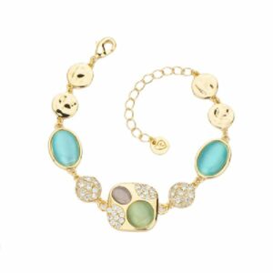 Bracciale centrale in brass dorato con cat eye verde, tanzanite,pav?? di zirconi clear ed elementi martellati - Misura Regolabile
