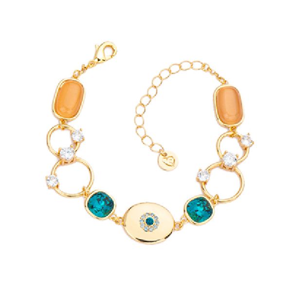 Bracciale elementi in brass dorato alternati con punti luce, cat eye albicocca e cristalli
ottanio - Misura Regolabile