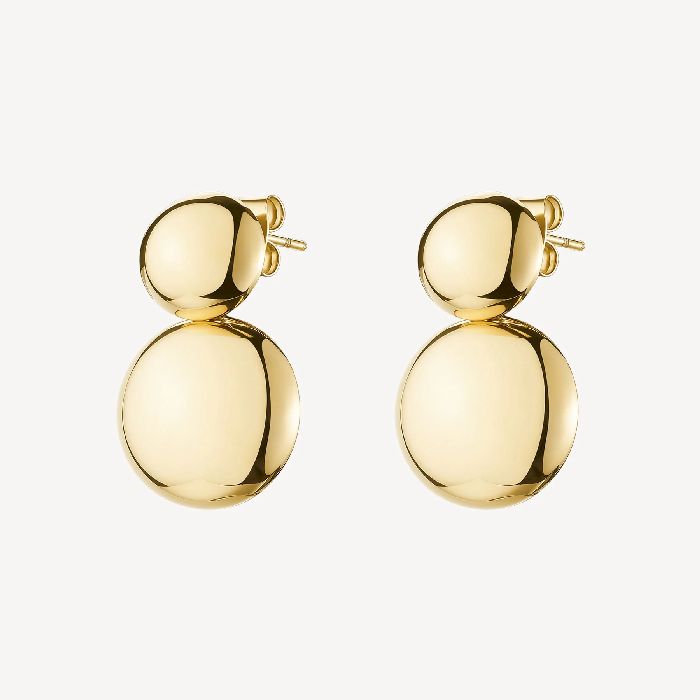 Orecchini pendenti in acciaio 316L e finitura pvd oro 14K, con dischi convessi.