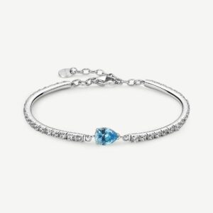 Bracciale semirigido in acciaio 316L con cubic zirconia chiari ed elemento centrale pear cubic zirconia colore acquamarina.