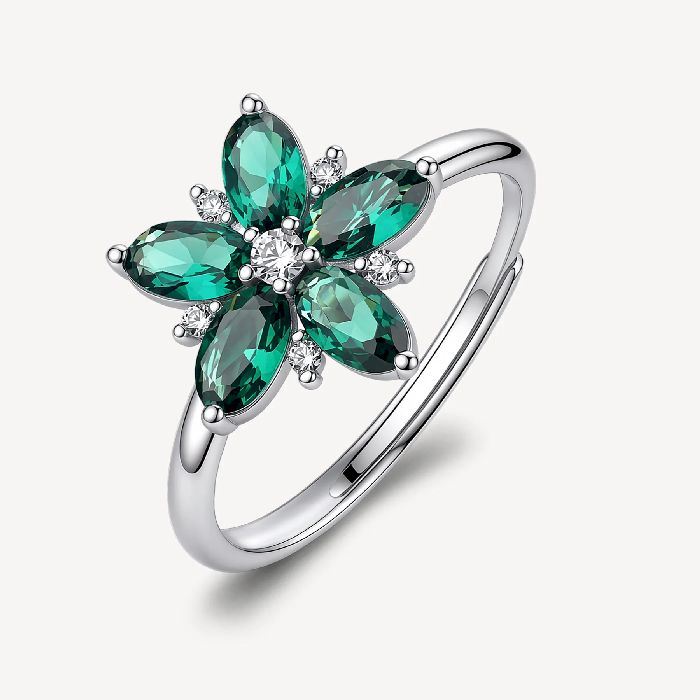 Anello regolabile in argento rodiato 925‰ a forma di fiore, con cubic zirconia chiari e cubic zirconia colore green.