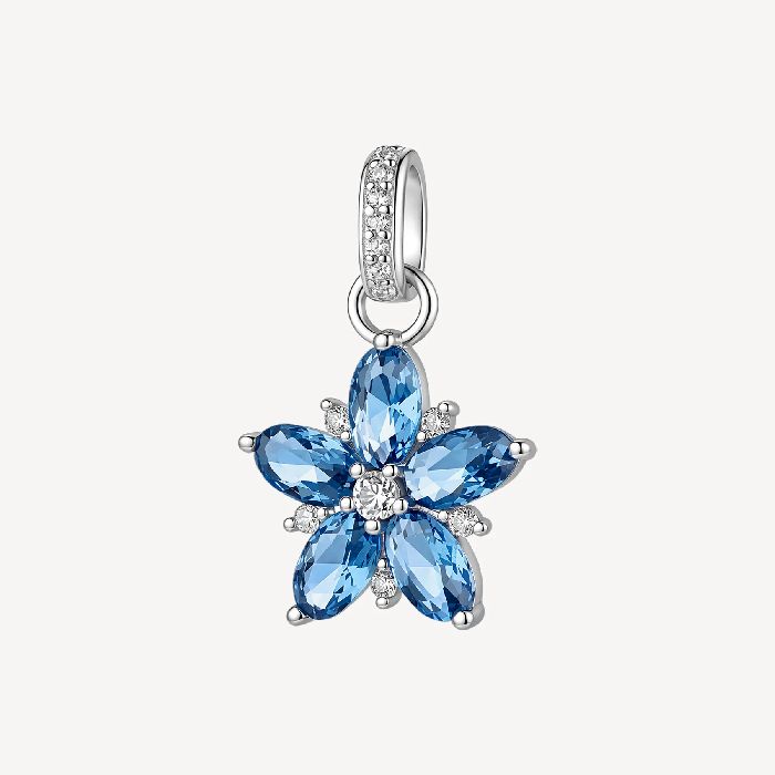 Pendente in argento rodiato 925‰ a forma di fiore, con cubic zirconia chiari e cubic zirconia colore sapphire.